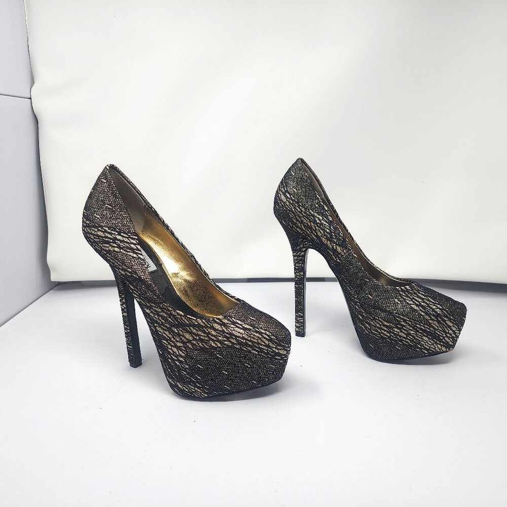 Beautiful pair of black and gold Steve Madden sparkle platform pumps